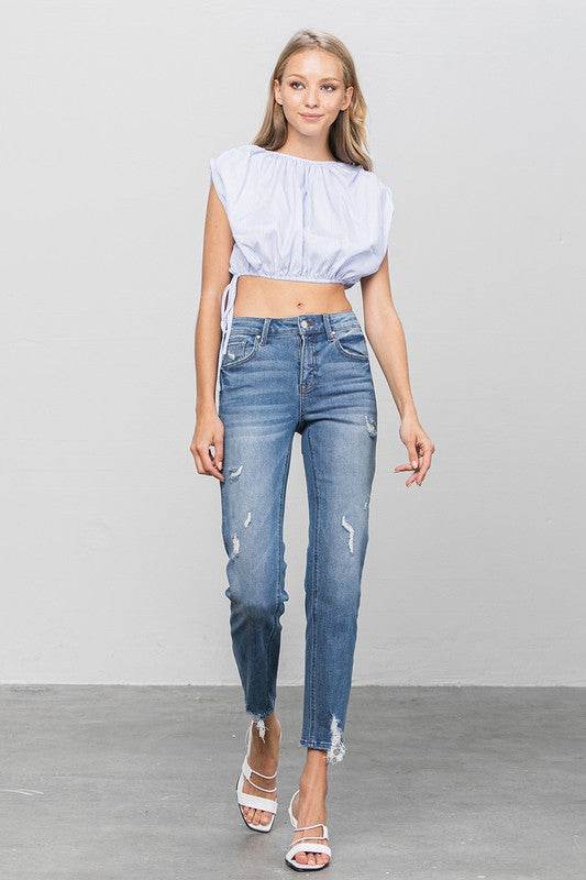 Mid-Rise Slim Girlfriend Jeans with Ripped Details - Fashions Envy