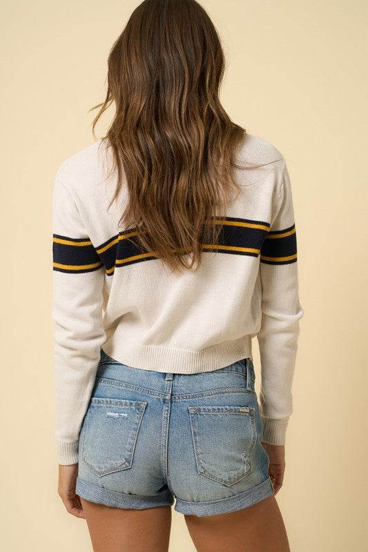 Mid-Waist Medium Wash Denim Shorts with Ripped Details - Fashions Envy