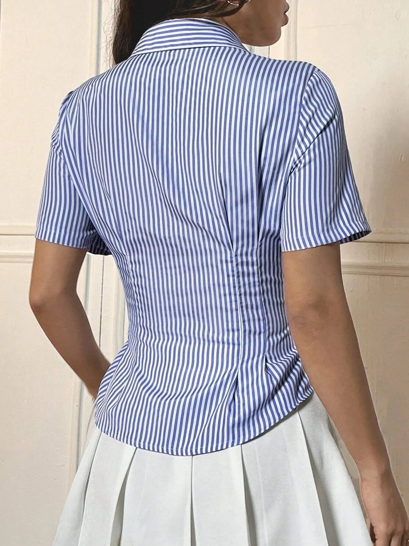 Trendsi blue and white striped Short Sleeve Button-Up Shirt back view showing fitted waist with pleated skirt