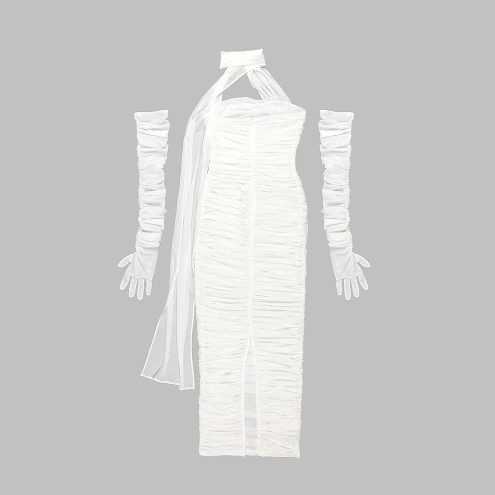 White dress with long sleeves and gloves on a gray background