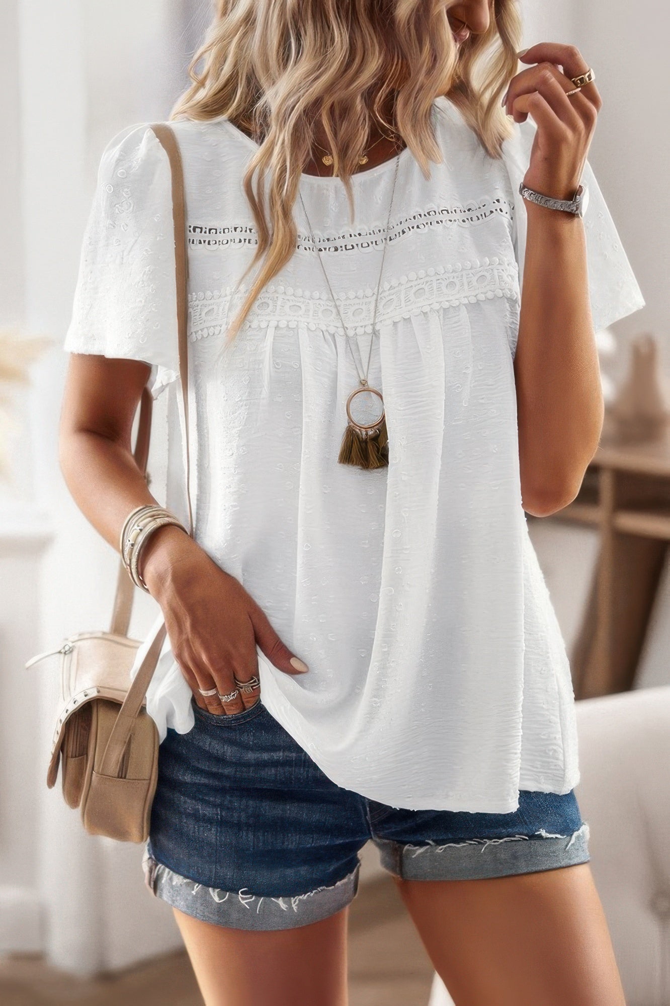 plus size solid short sleeve top white textured lace yoke paired with denim shorts and layered necklace casual summer outfit