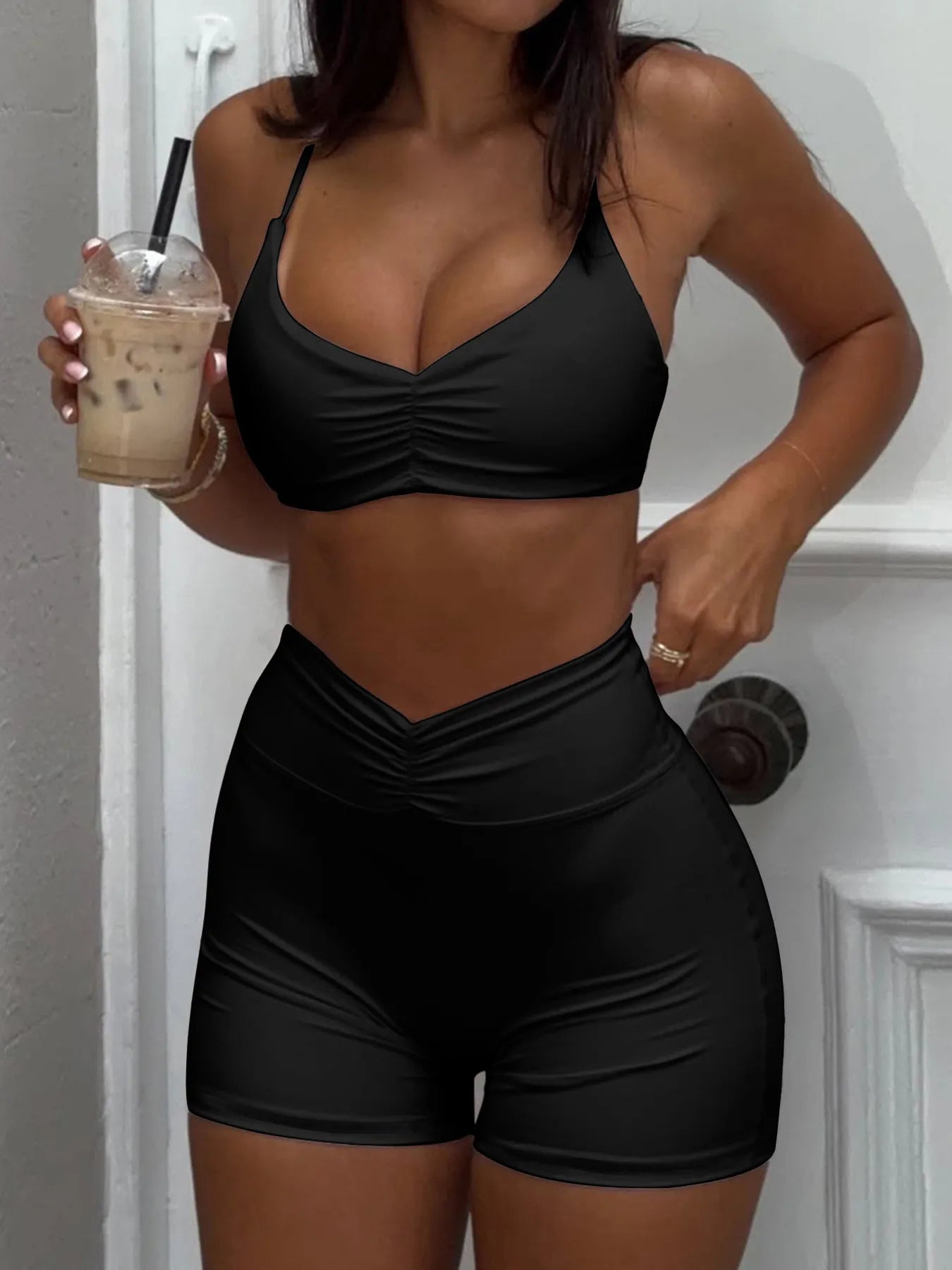 Trendsi Shorts Active Set in black featuring a sleek design, perfect for workouts or casual outings