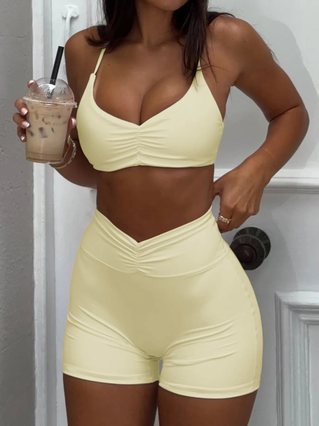 Trendsi Yellow Shorts Active Set featuring a stylish crop top and high-waisted shorts for a trendy summer look