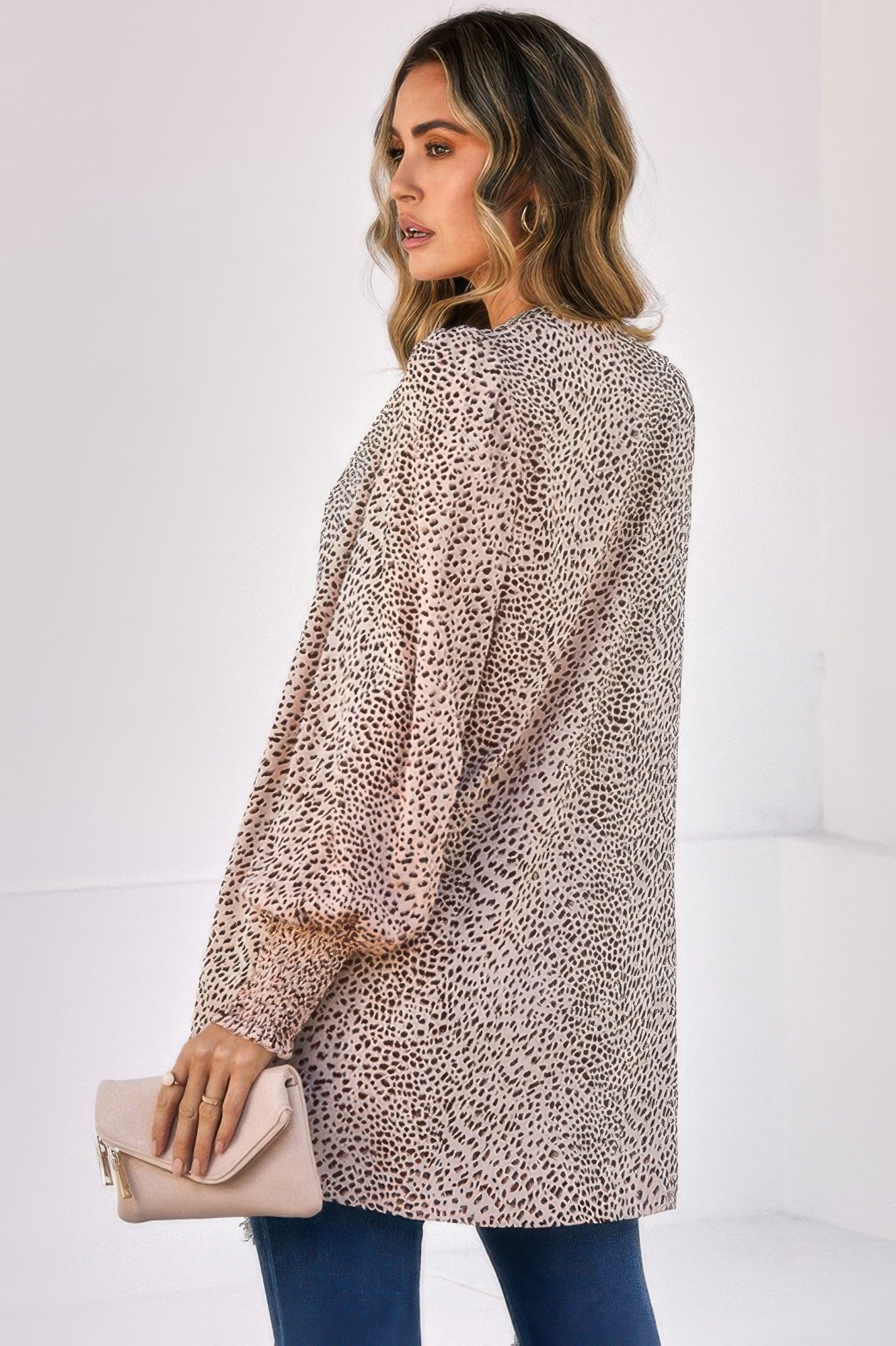 CCWHOLESALECLOTHING leopard print front open top long sleeve beige tunic with relaxed fit worn with jeans