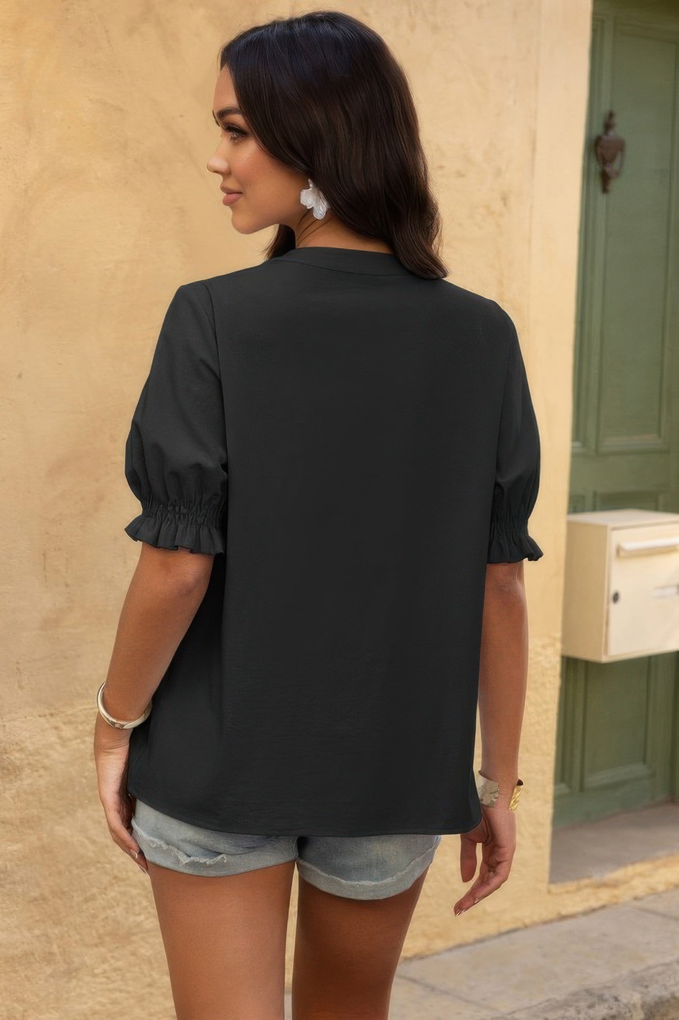 CCWHOLESALECLOTHING boho v neck button down shirt charcoal short sleeves ruffle cuffs back view with denim shorts