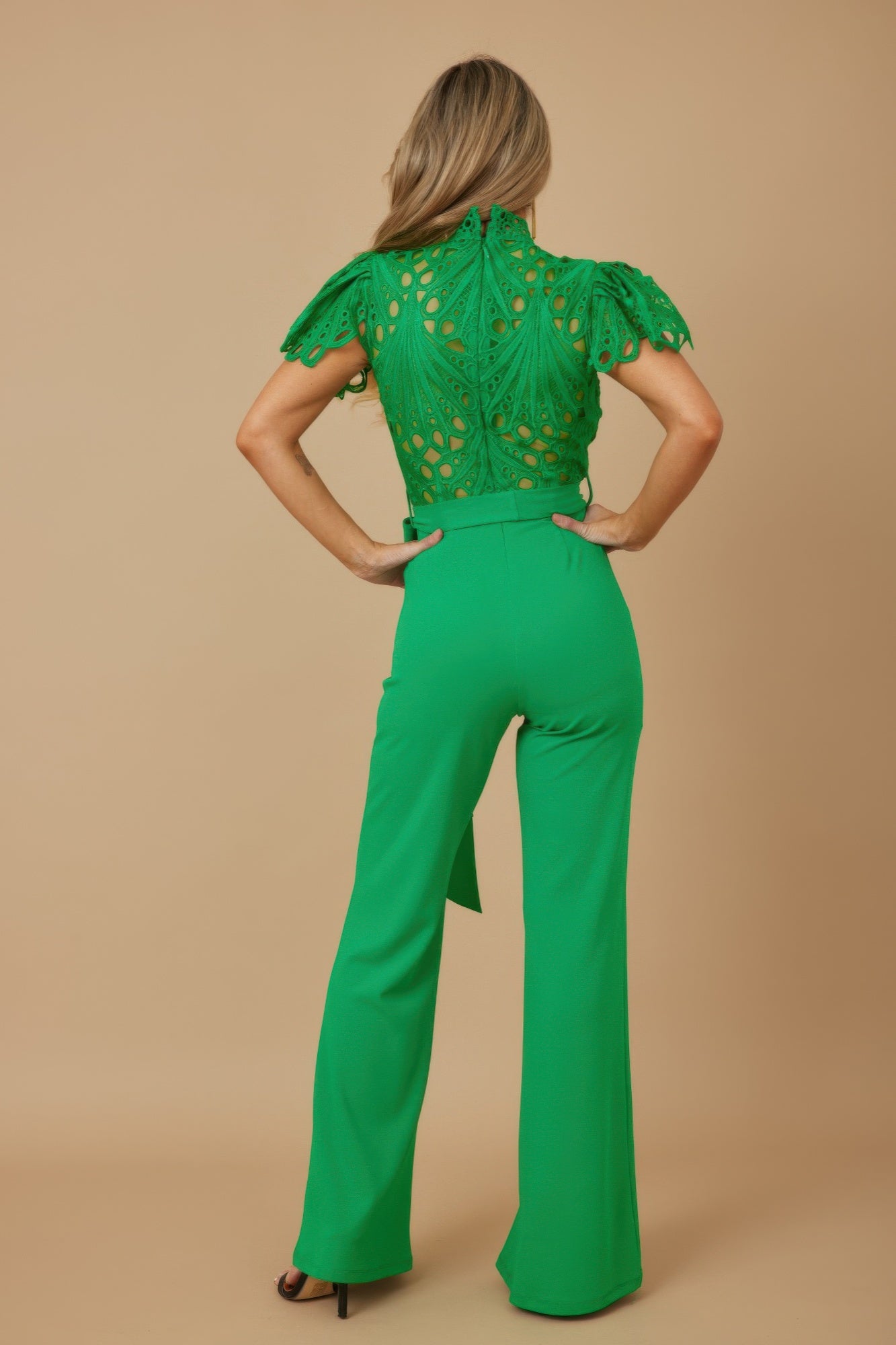Green crochet jumpsuit for women back view with high neck crochet lace top and high waist wide leg pants
