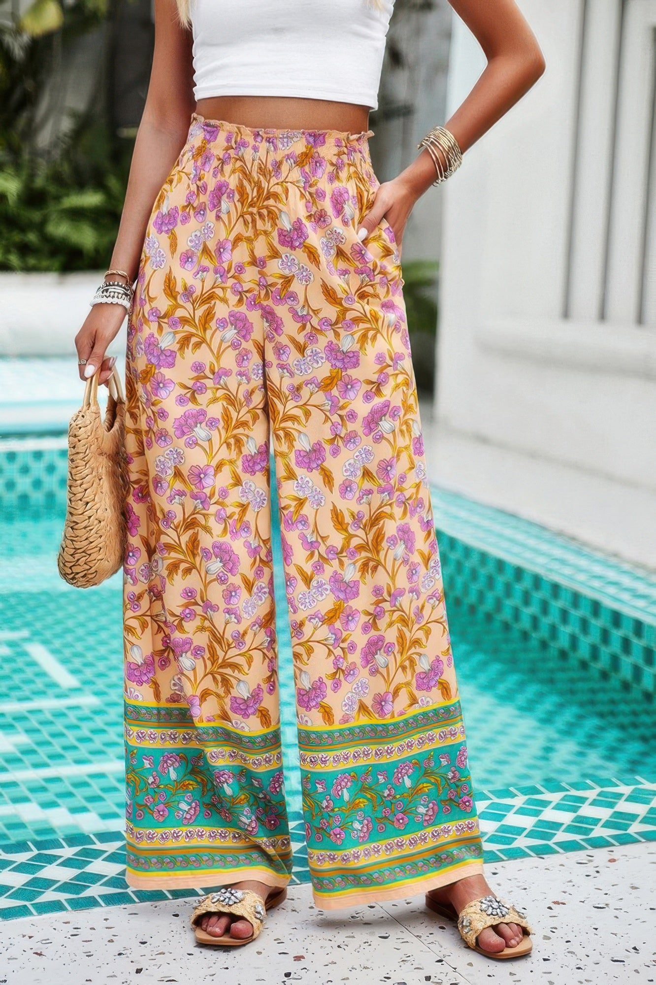 floral wide leg pants for women in yellow pink botanical print with elastic waist pockets and sandals