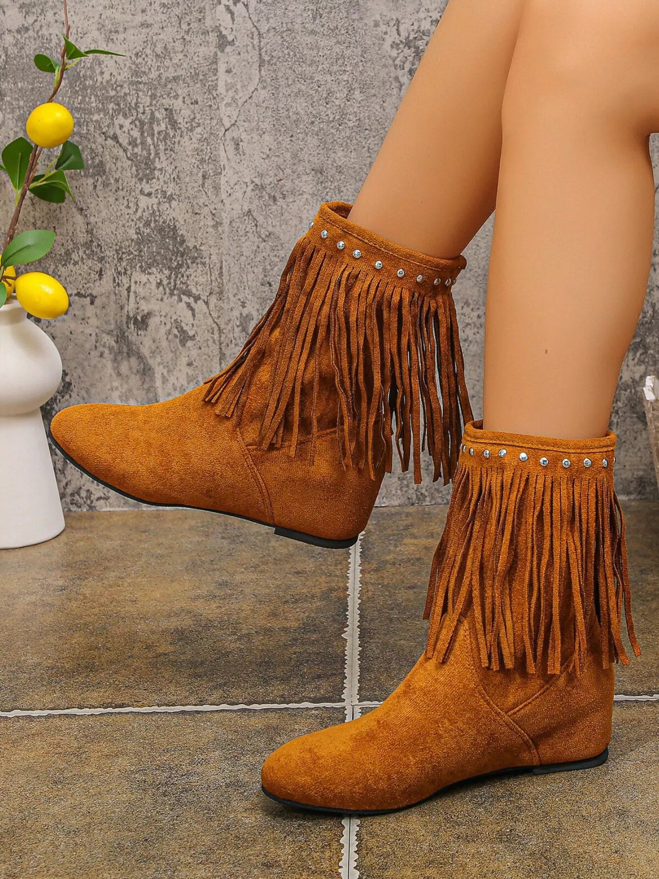 Trendsi brown suede fringe Western Style Ankle Boots with stud trim and low flat heel on model
