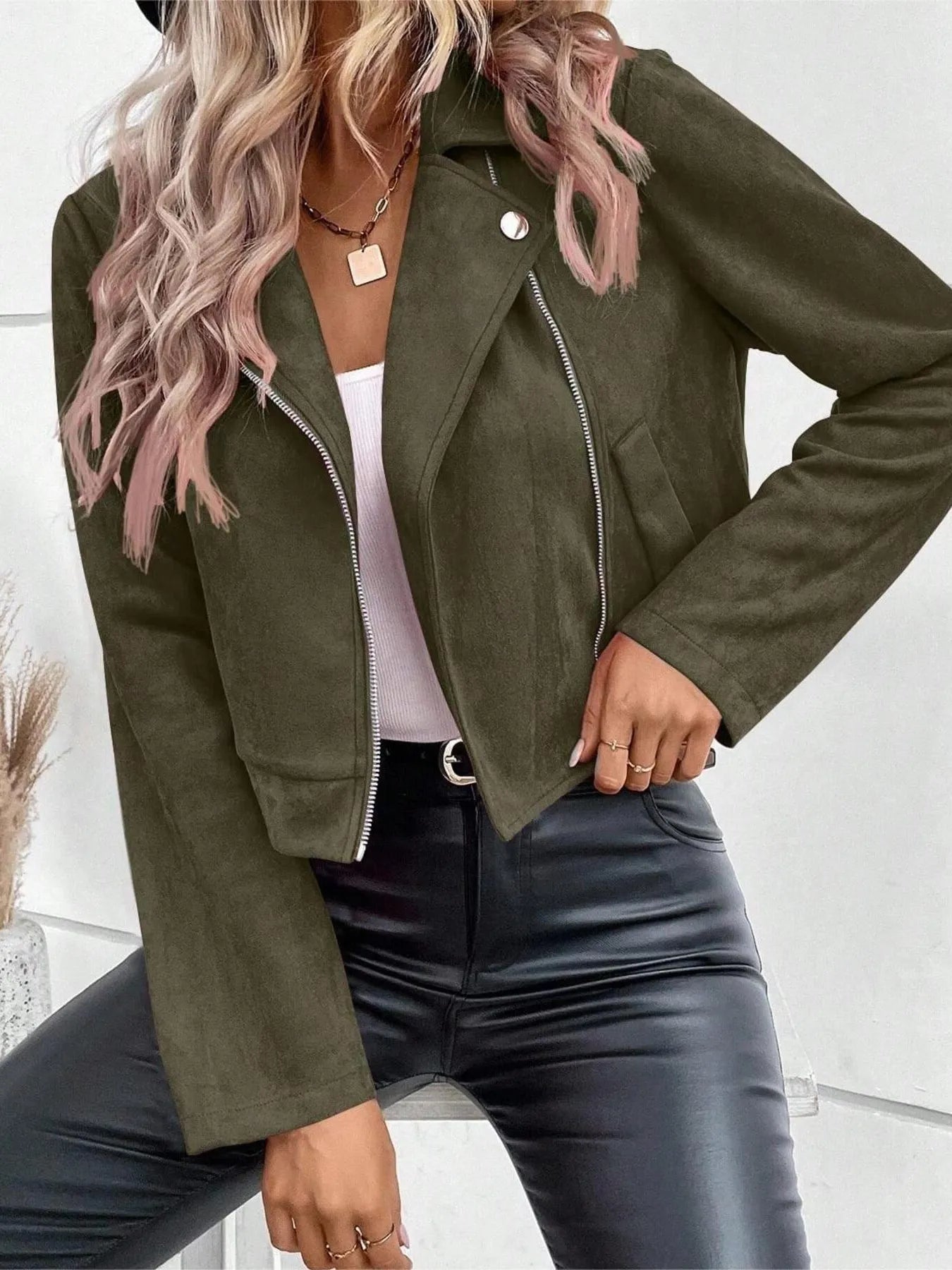 Trendsi women's suede moto jacket in olive green on model with asymmetrical zipper and silver hardware