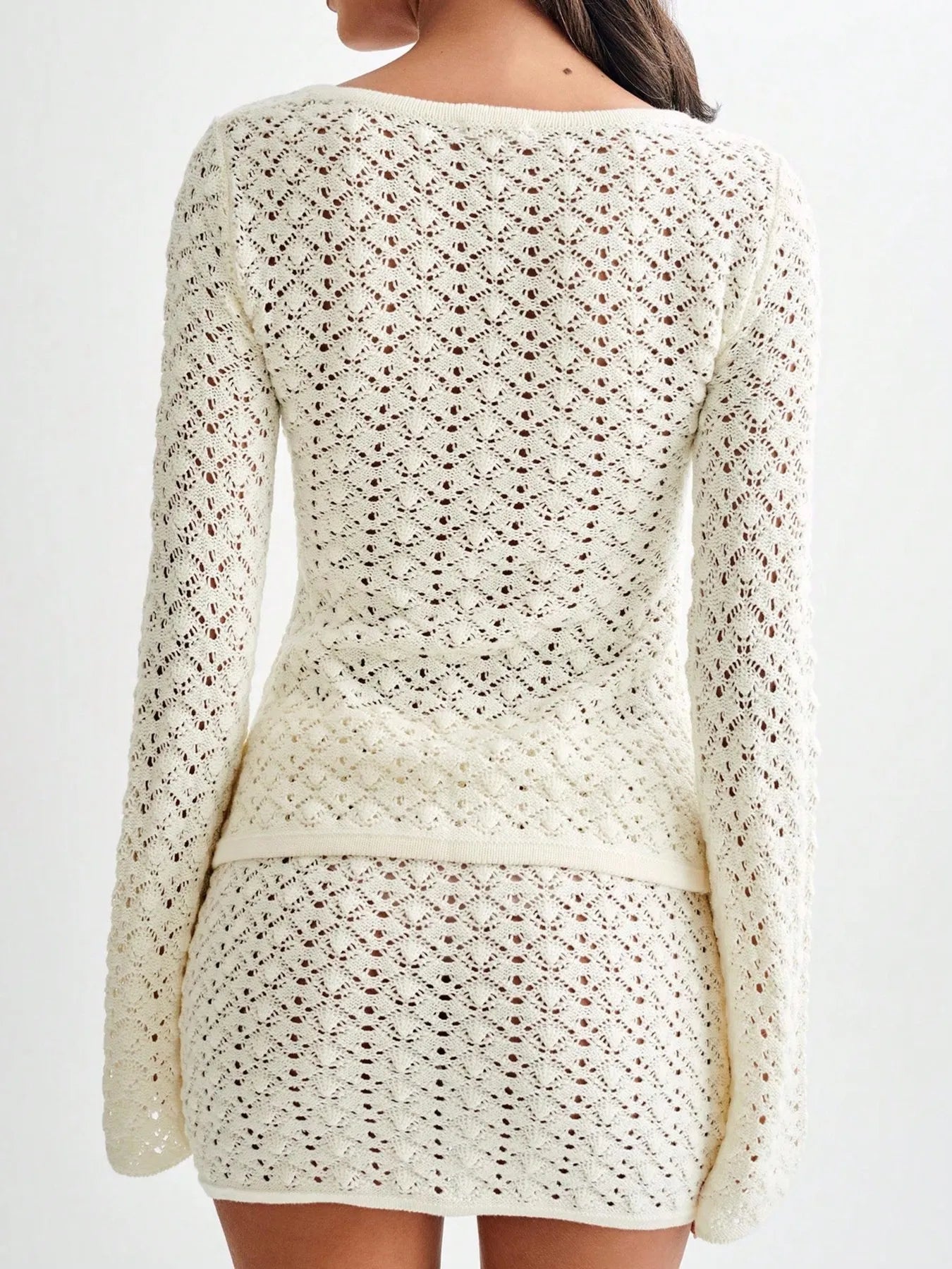 Trendsi cream Button Up Crochet Cardigan with long sleeves and intricate lace pattern shown from the back