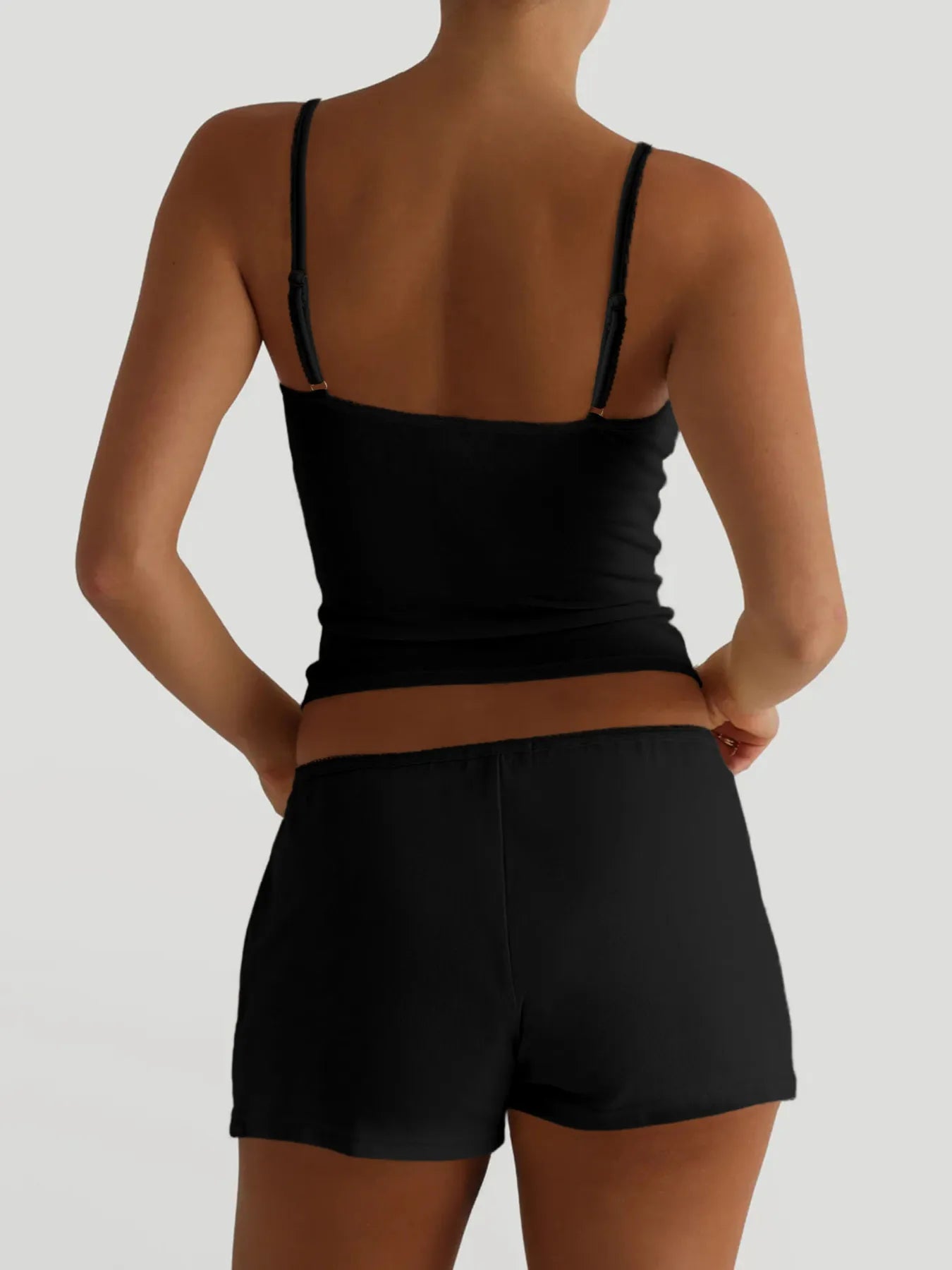Trendsi Cami and Shorts Set in black featuring a comfortable tank top and matching shorts