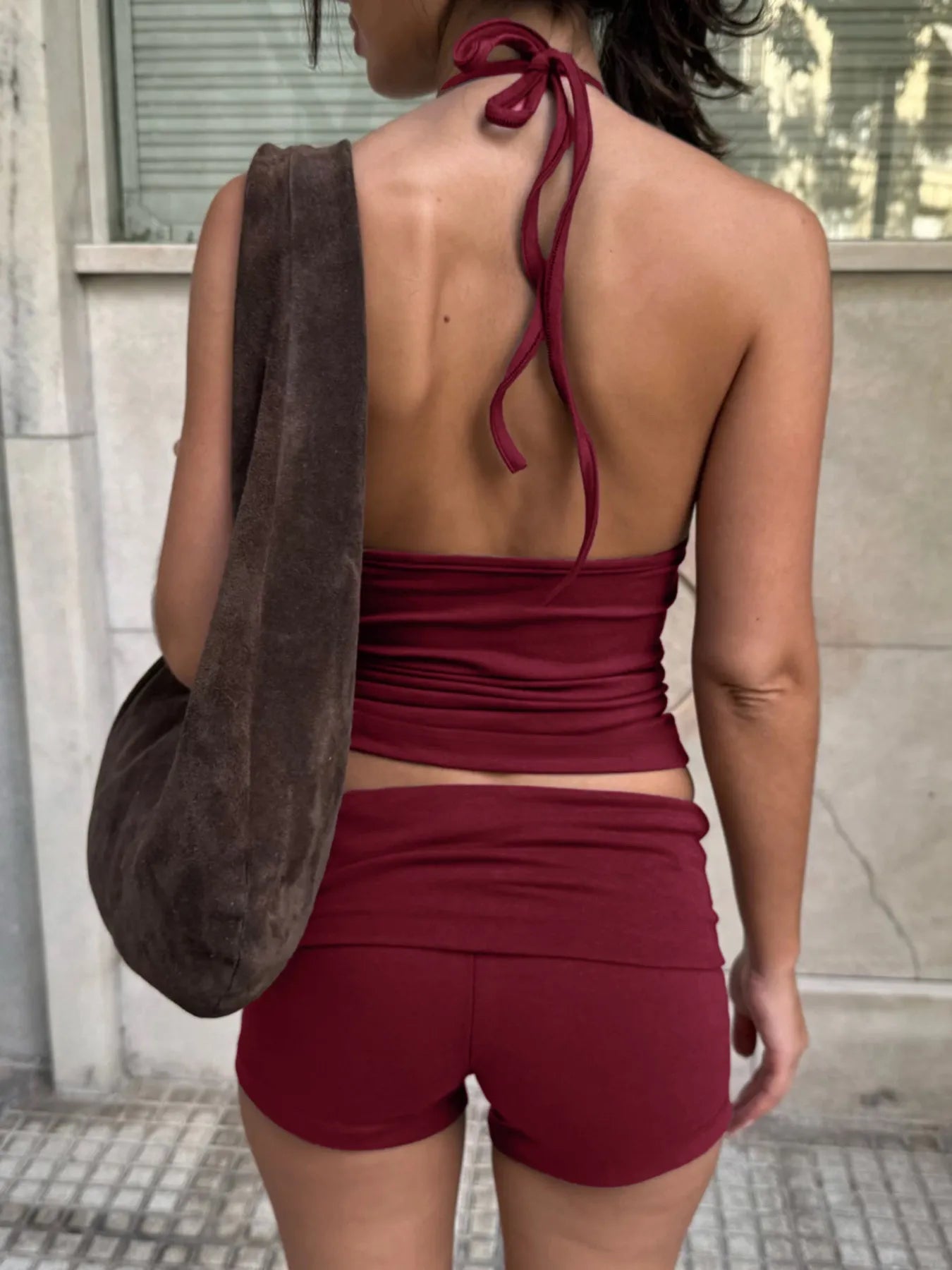 Trendsi Cami and Shorts Set in burgundy, featuring a halter neck and fitted shorts for a stylish summer look