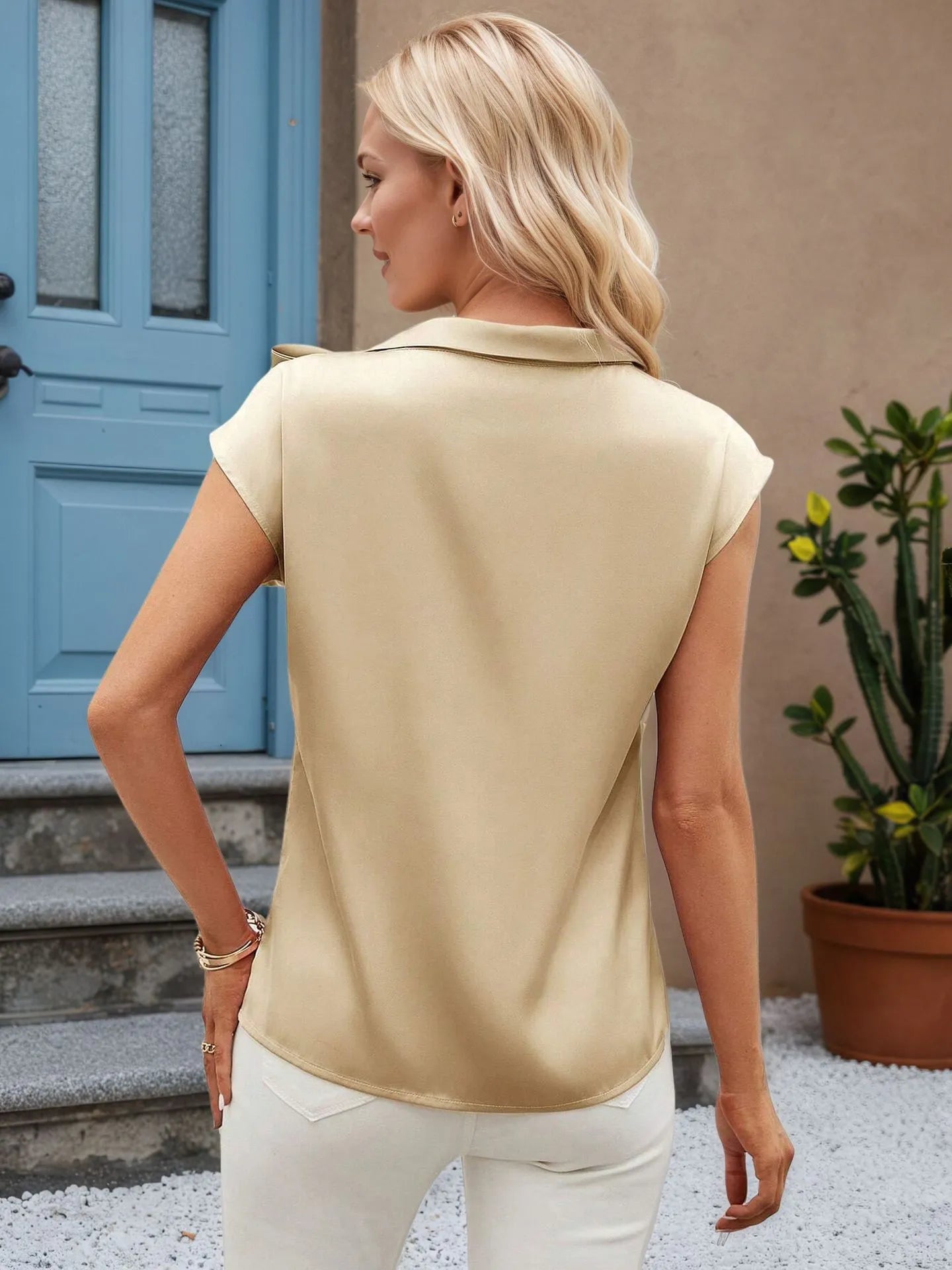 Trendsi women's bow tie blouse back view beige short sleeve collared top paired with white pants