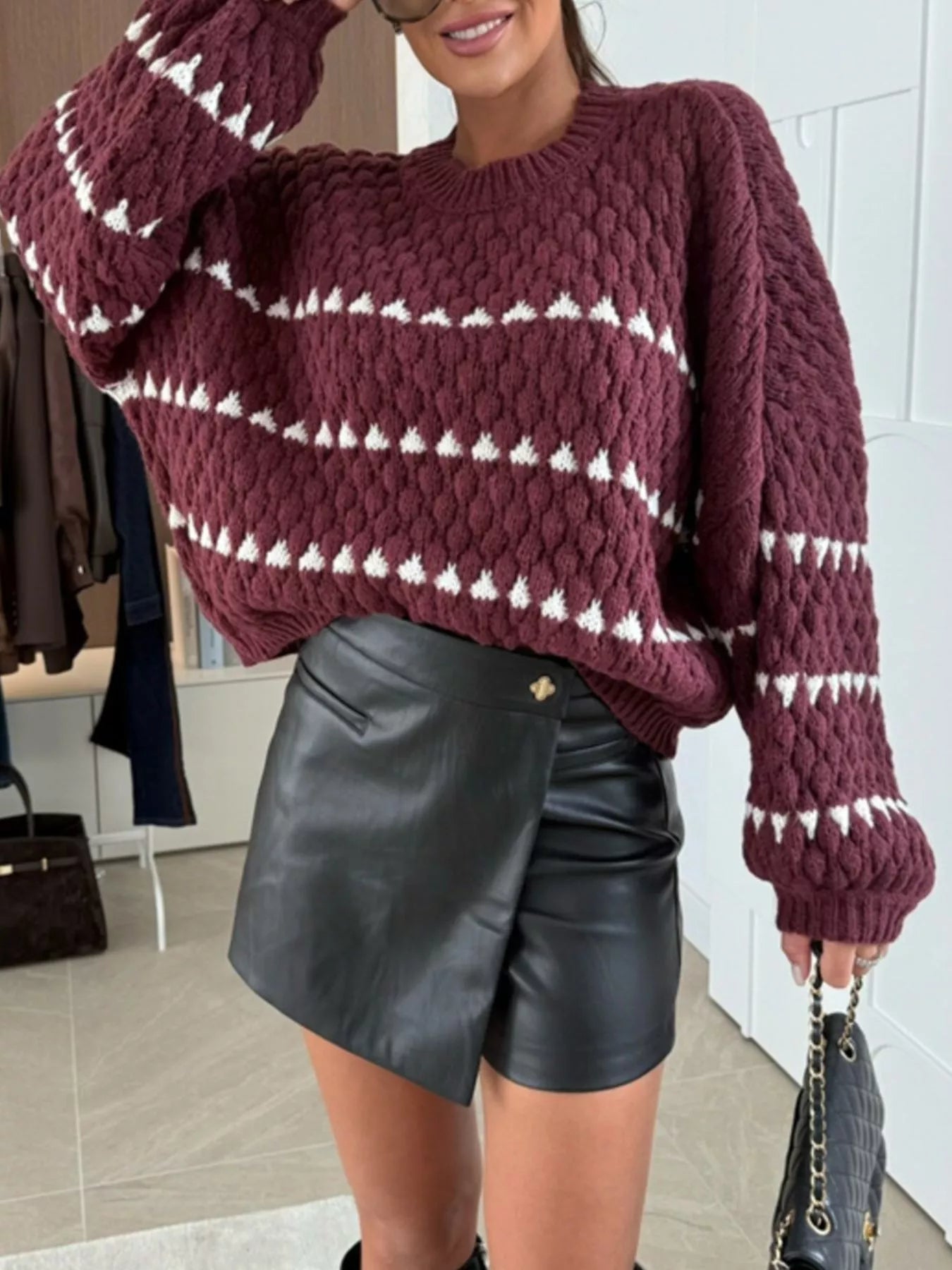 Trendsi Chunky Knit Striped Sweater in Burgundy with White Stripes, paired with a stylish leather mini skirt