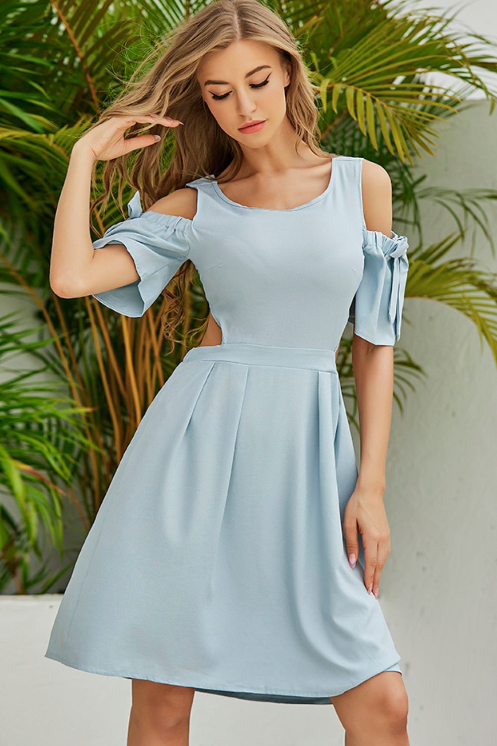 Trendsi Light Blue Dress with Stylish Cutout and Bow Detail for Elegant Summer Wear