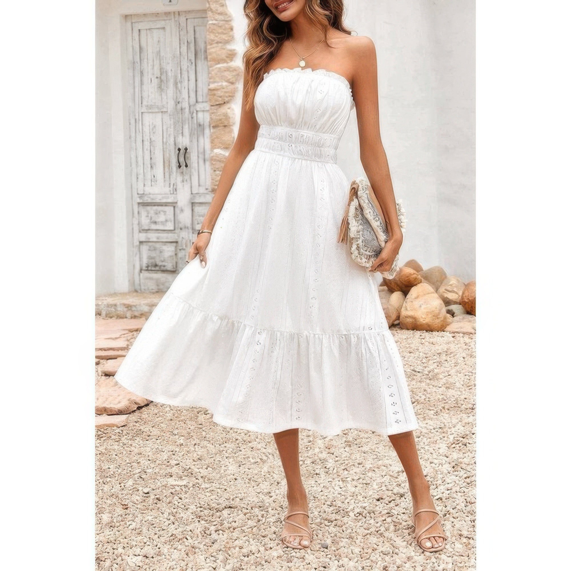 Strapless white eyelet midi Elasit Waist Ruffle Dress with smocked waist and ruffle hem styled with clutch and sandals