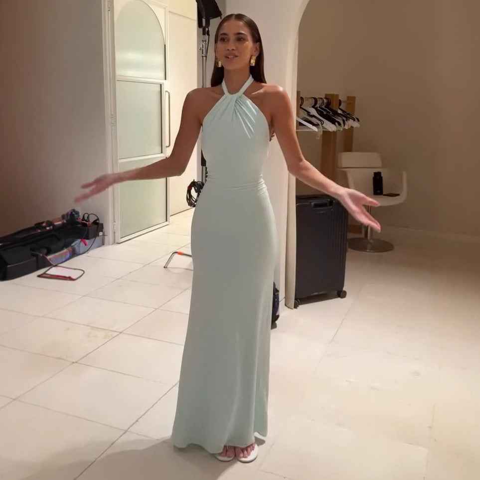 Elegant Formal Gown in light blue with a halter neck design, perfect for special occasions