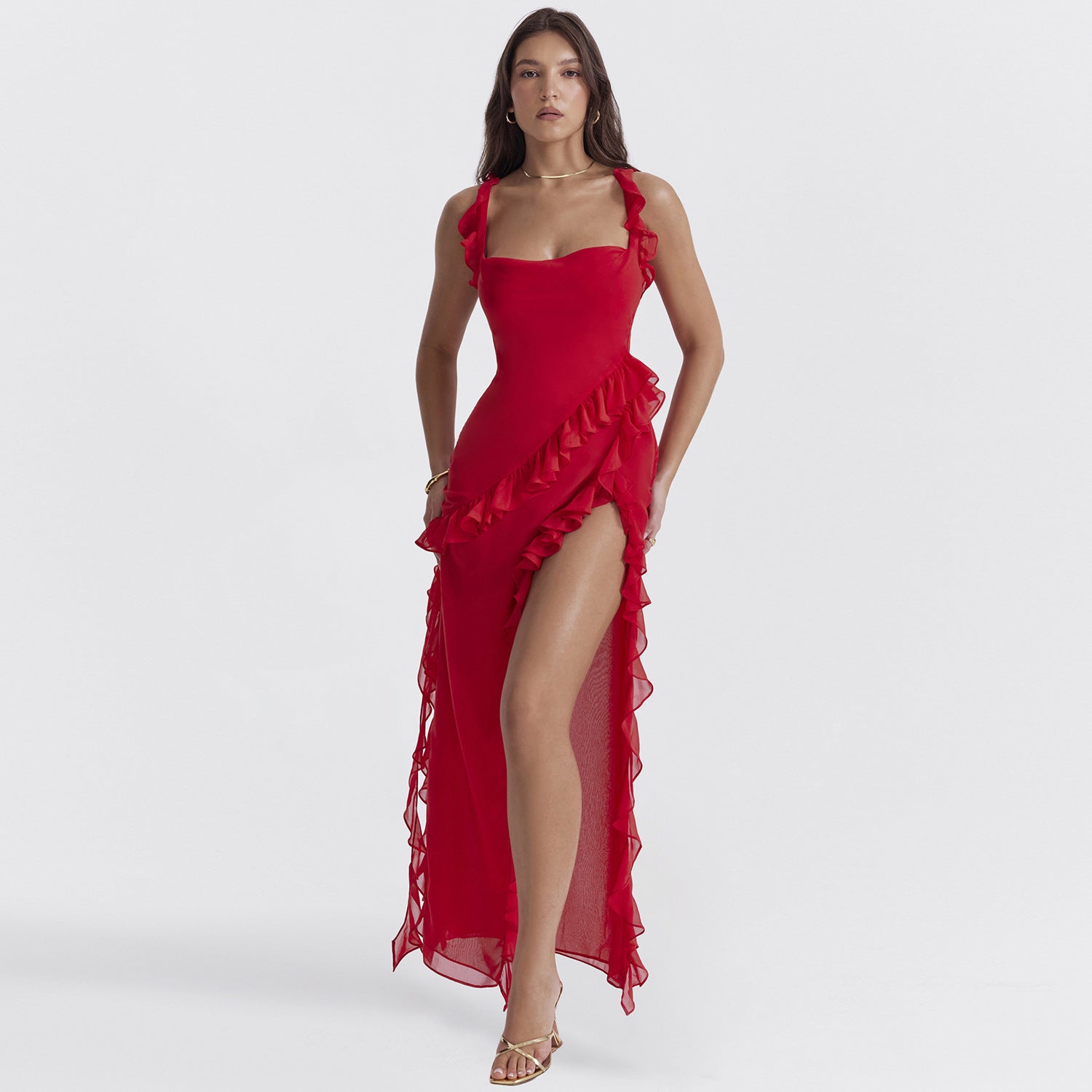 Elegant Ruffled Evening Maxi Dress in vibrant red with side slit and ruffle details worn by model