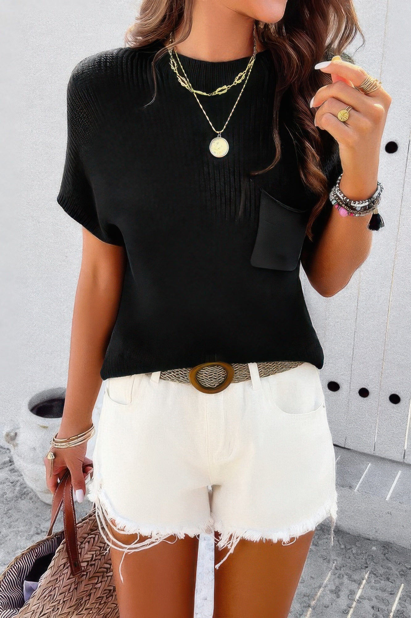 CCWHOLESALECLOTHING black ribbed knit loose top with short sleeves and chest pocket styled with white denim shorts