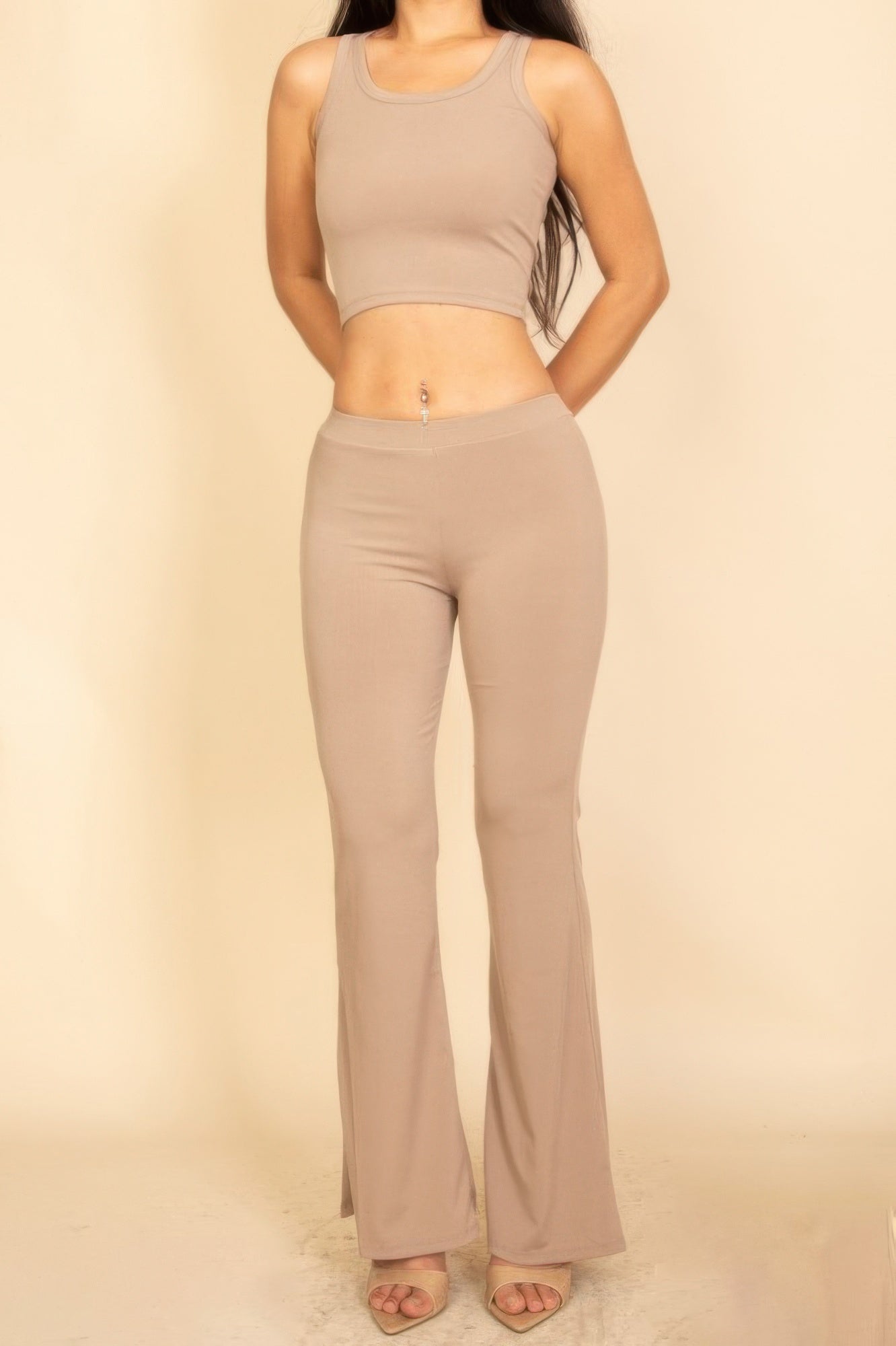 Beige Flared Pants Set from CCWHOLESALECLOTHING featuring a fitted crop top and flared bottoms