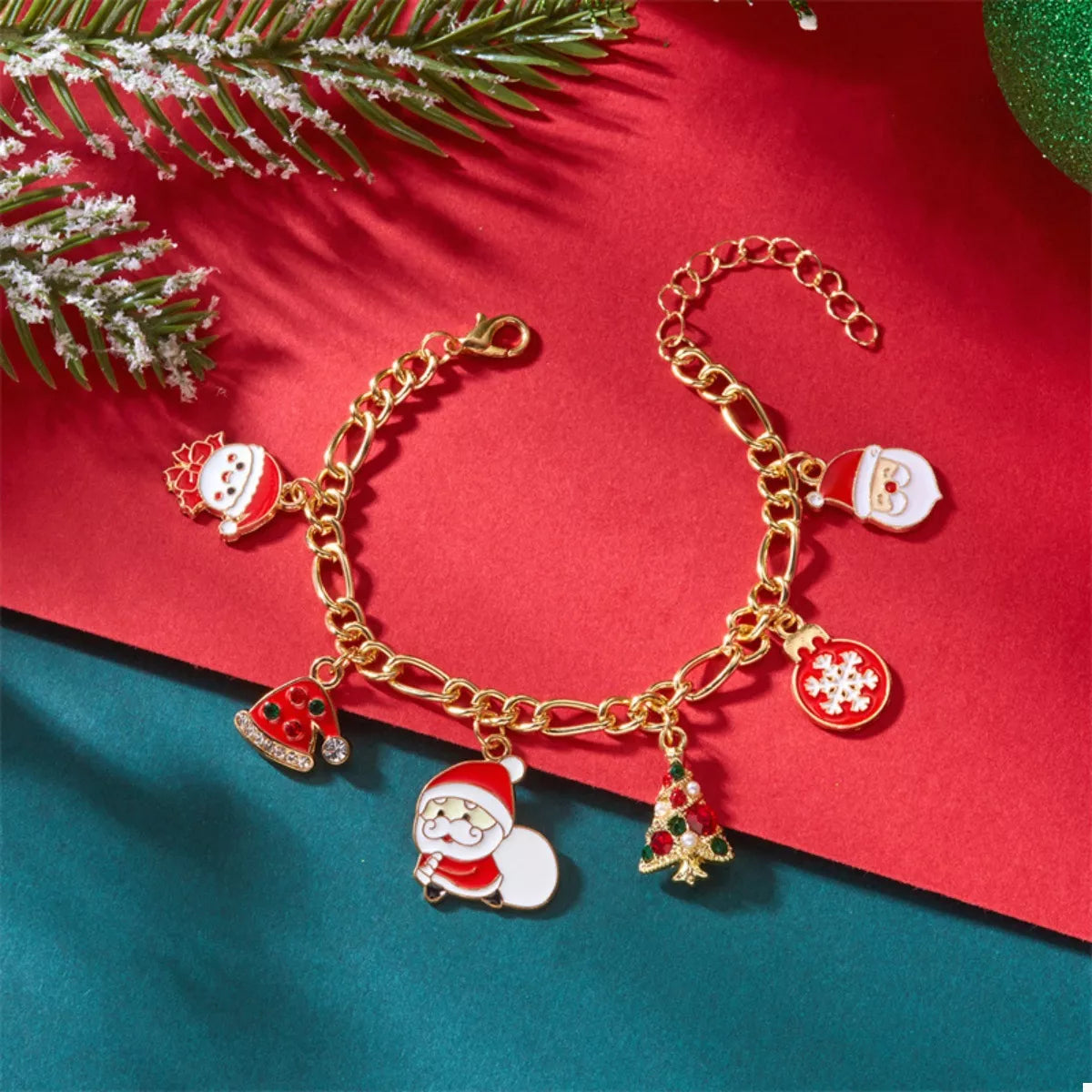 Gold-Plated Charm Bracelet with festive holiday-themed charms for cheerful accessory lovers