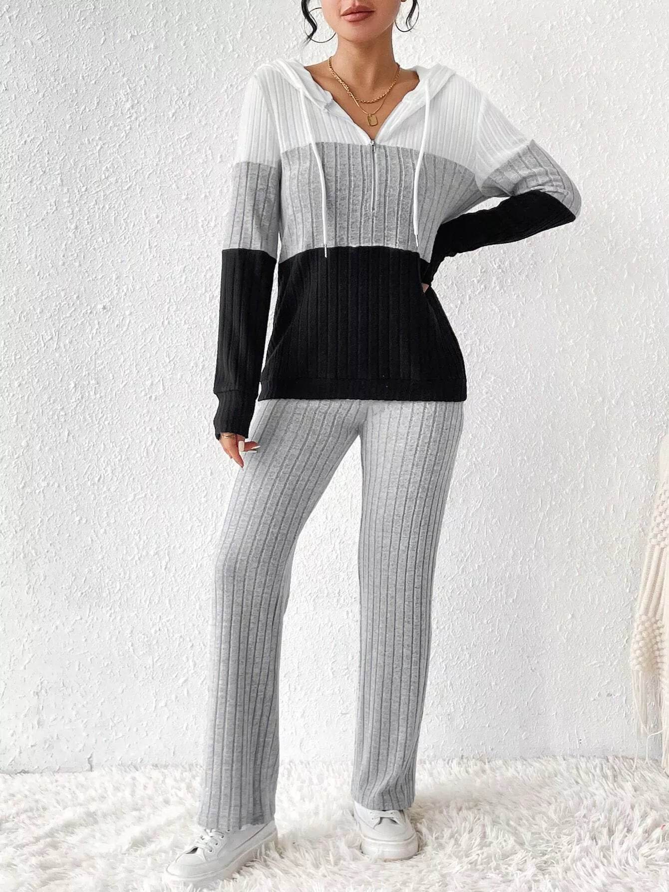 Trendsi Hooded Top and Pants Set featuring a stylish ribbed design in black, gray, and white colors