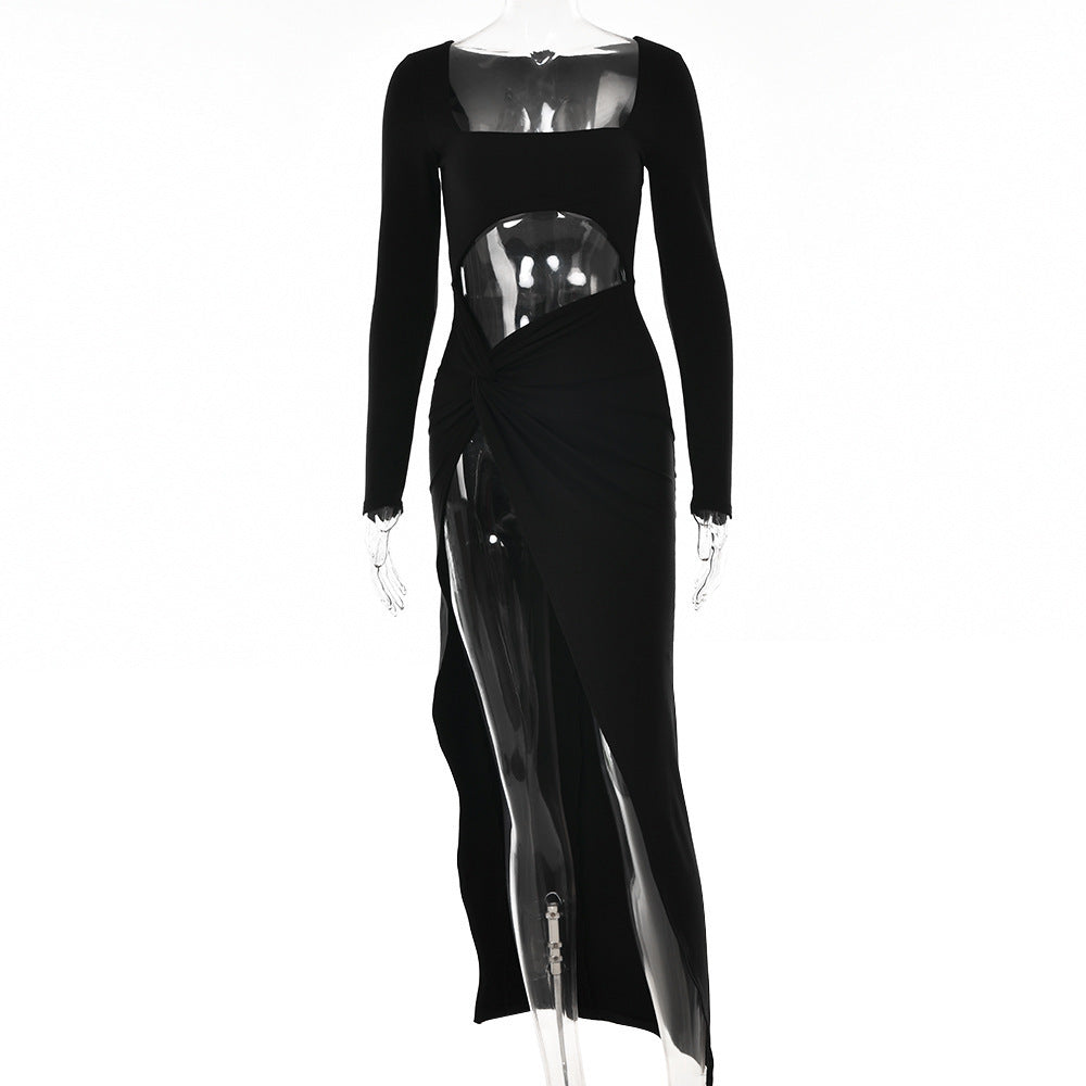 Trendsi Long Sleeve Side Cutout Maxi Dress in black with asymmetric hem on clear mannequin