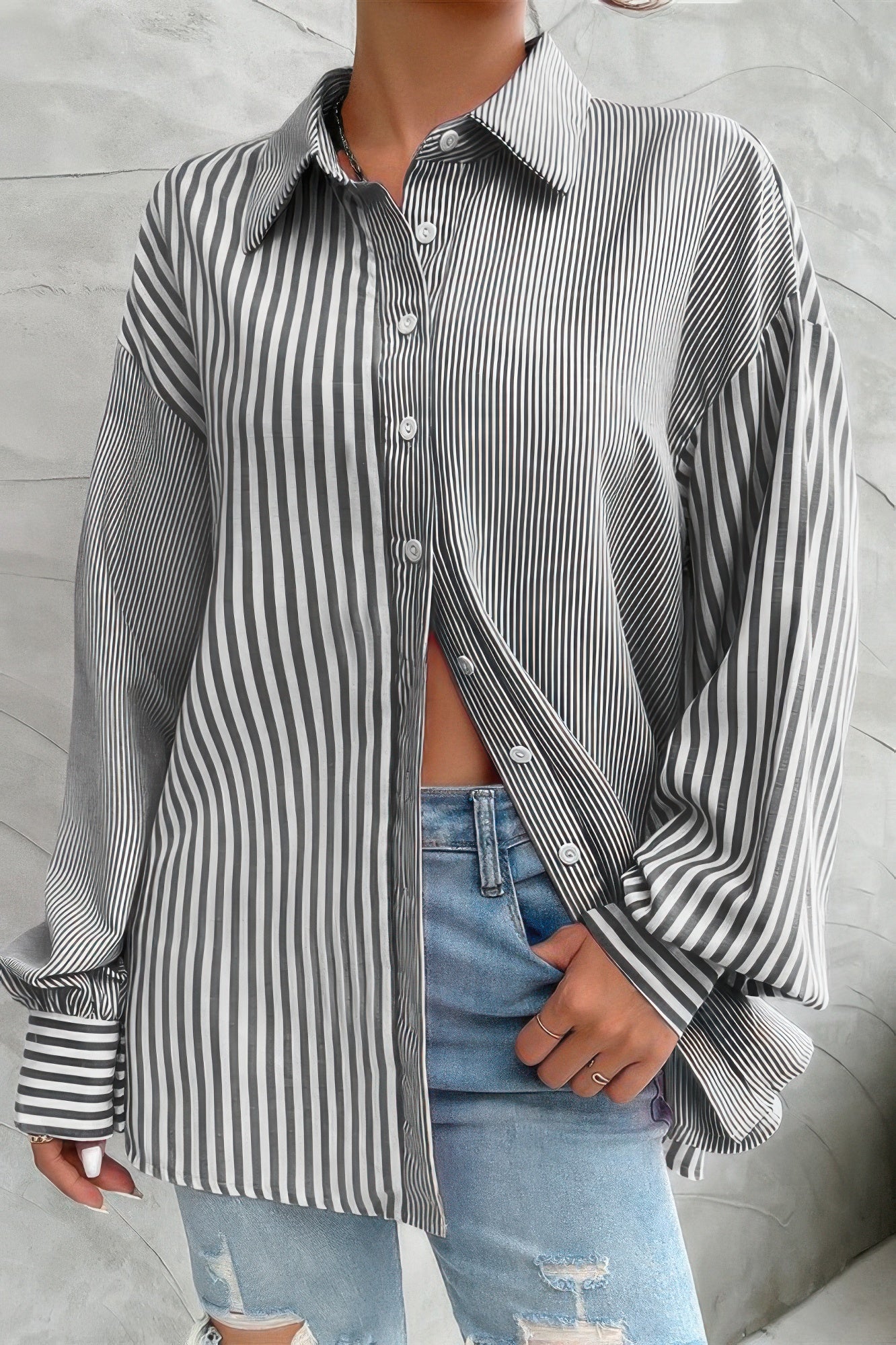 CCWHOLESALECLOTHING stripe print button down shirt oversized black white vertical stripes with relaxed fit styled with jeans