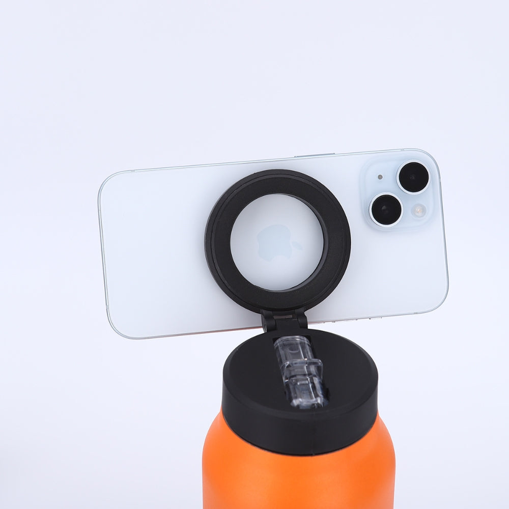 Fashions Envy Magnetic Phone Holder attached to orange water bottle lid holding white iPhone horizontally