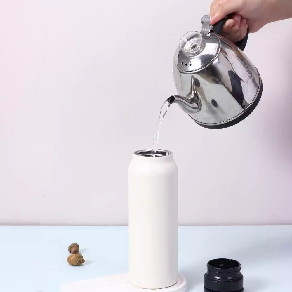 Fashions Envy Magnetic Phone Holder styled with white insulated bottle being filled from kettle on table