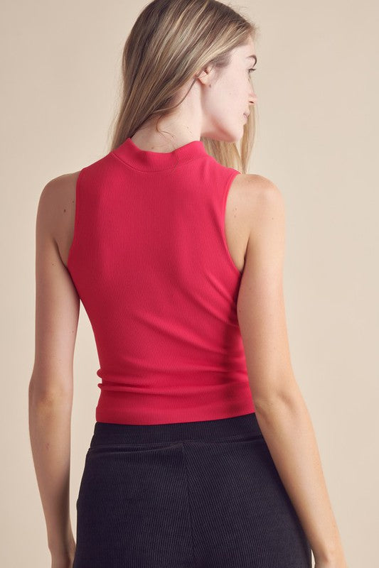 Yelete Mock Neck Tank in vibrant pink, featuring a fitted design for a stylish look