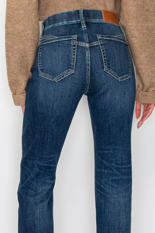 Artemis Vintage back view of dark wash tummy control high rise jeans for women with rear pockets