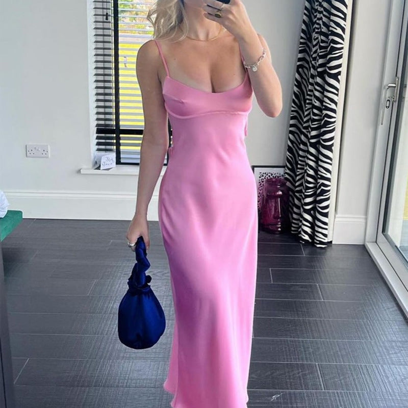 Trendsi pink satin slip dress with thin straps and a sleek, floor-length design