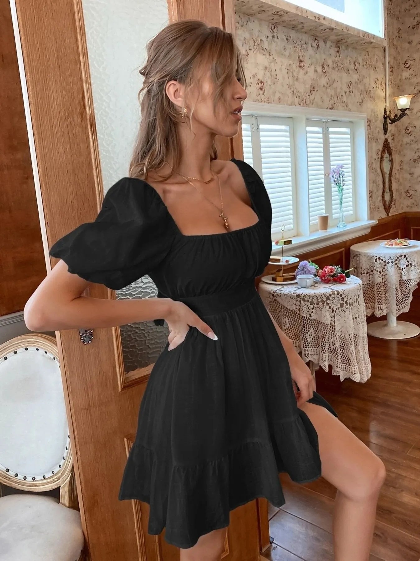 Trendsi Puff Sleeve Mini Dress in black with a square neckline and tiered skirt for a stylish look