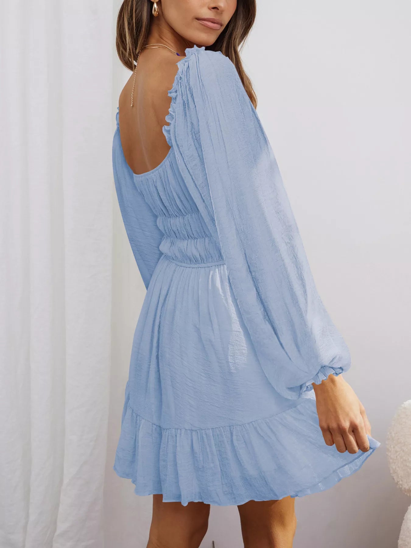 Trendsi Romantic Flowy Dress in Light Blue with billowy sleeves and ruffled hem for a stylish look