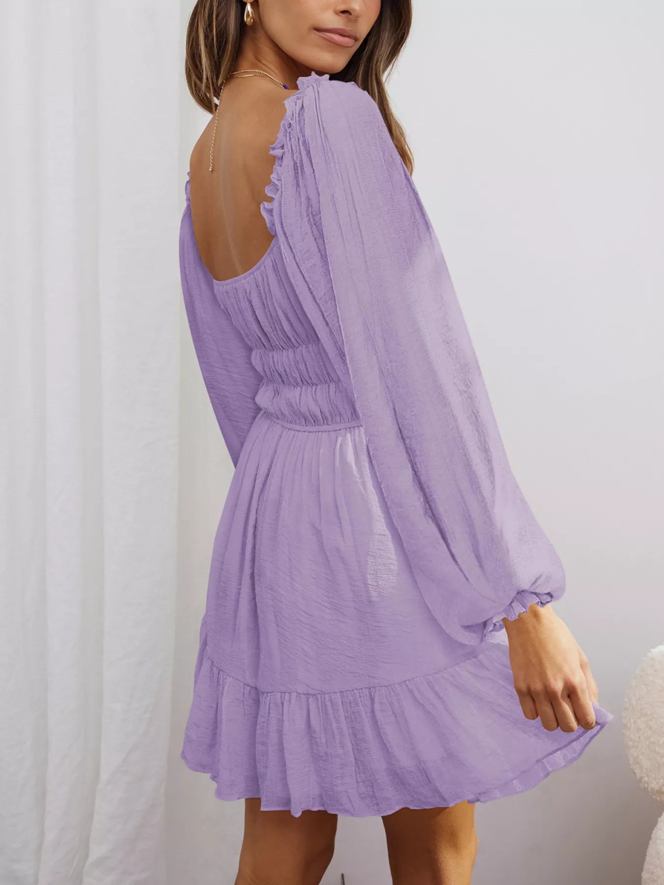 Trendsi Romantic Flowy Dress in Lavender with Long Sleeves and Ruffled Hem for a Stylish Look