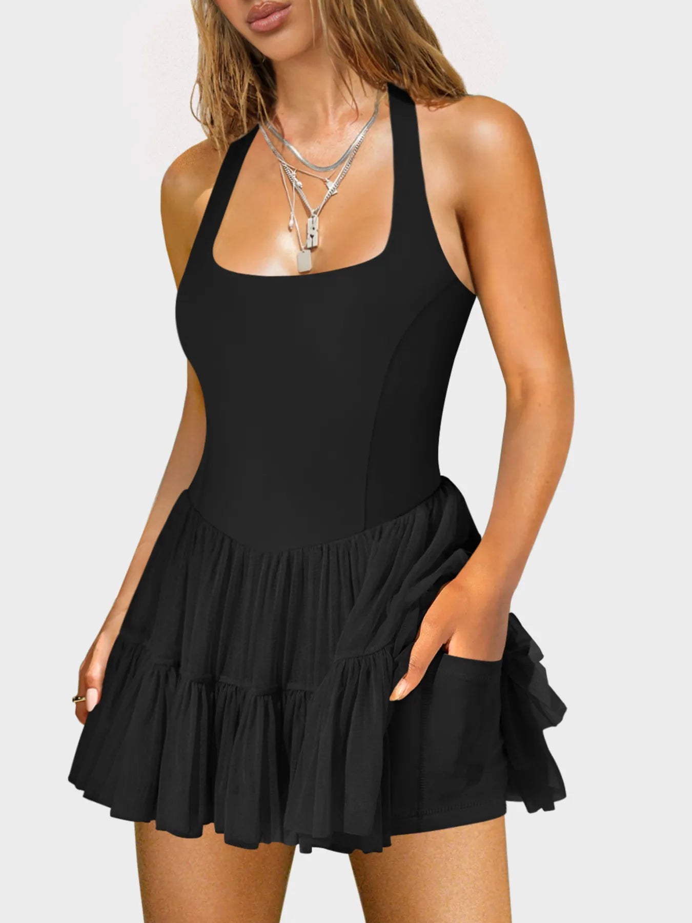 Trendsi Ruffle Swim Dress in black with a flared skirt and adjustable straps for stylish beachwear