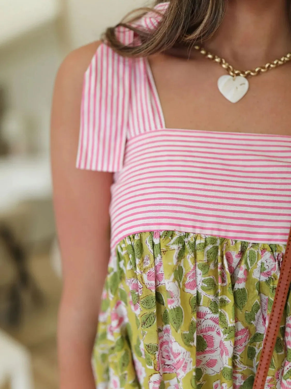 Trendsi Tie Shoulder Mini Dress with pink striped bodice green floral skirt and adjustable shoulder tie