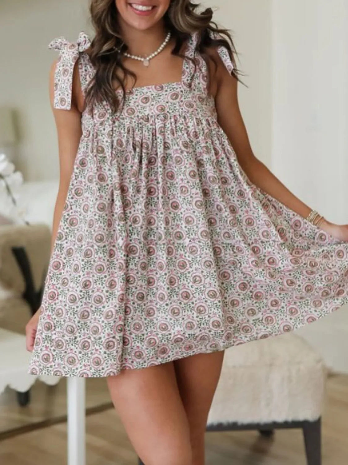 Trendsi Tie Shoulder Mini Dress floral smocked bodice lightweight boho summer dress on smiling model