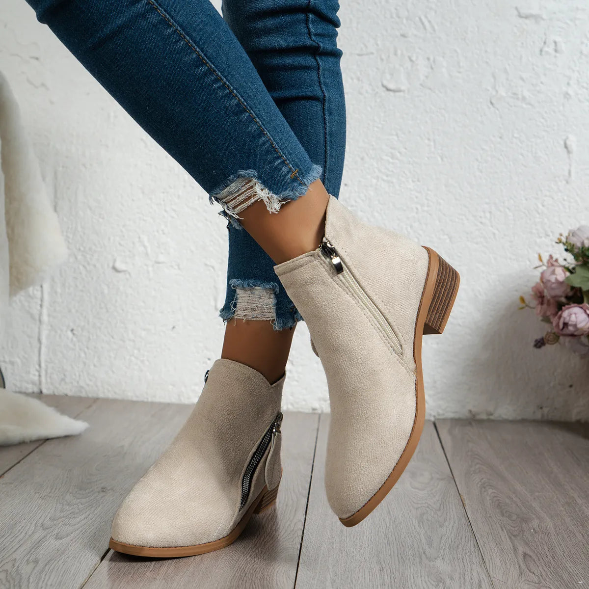 Trendsi beige suede women's side zip ankle boots with low stacked heel and side zipper styled with ripped skinny jeans