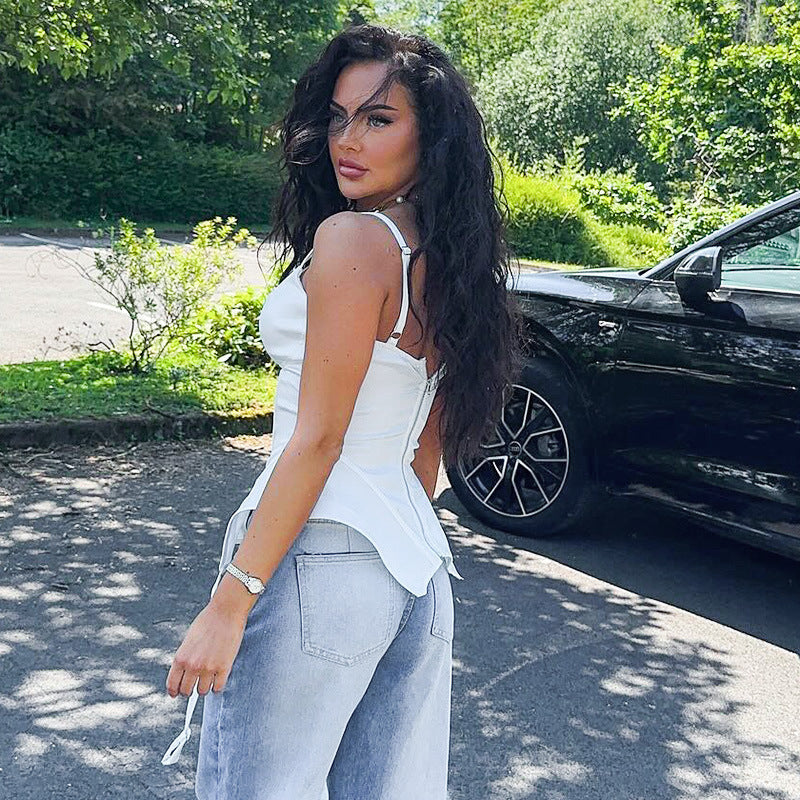 Trendsi Boning Corset Top white satin spaghetti strap with structured boning paired with light wash jeans