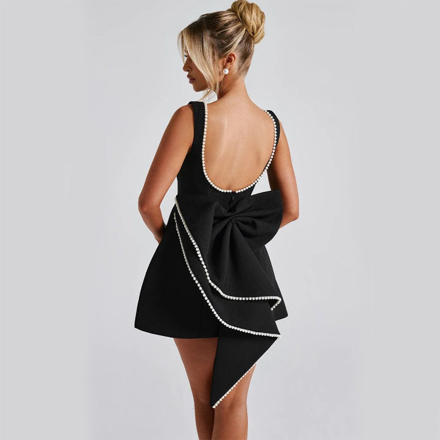 Elegant Solid Color Mini Dress with Open Back and Decorative Bow Detail for Stylish Outfits