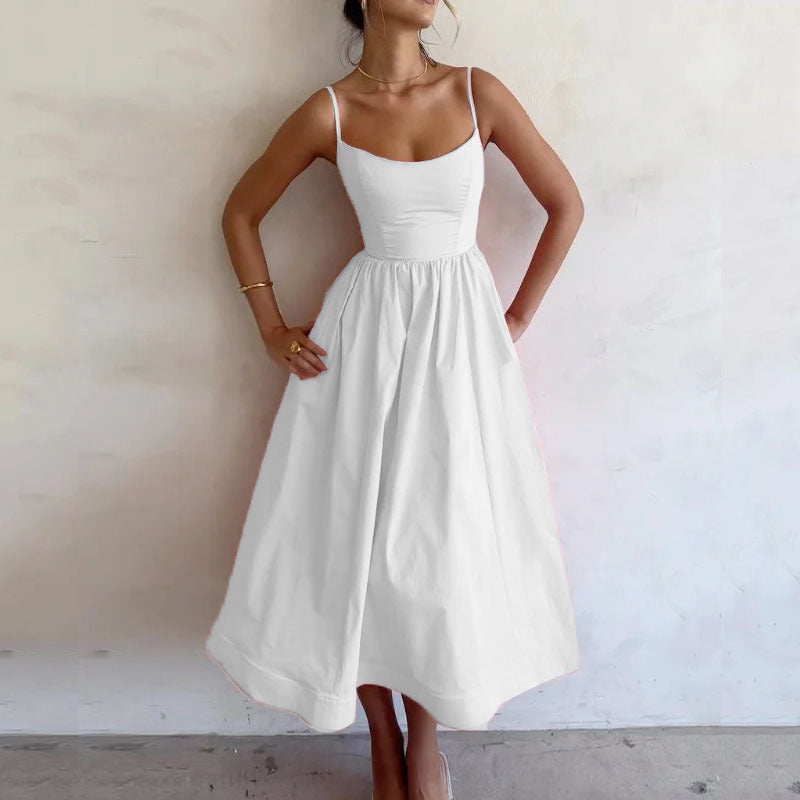 Trendsi solid color summer maxi dress in white with spaghetti straps and a flowy skirt