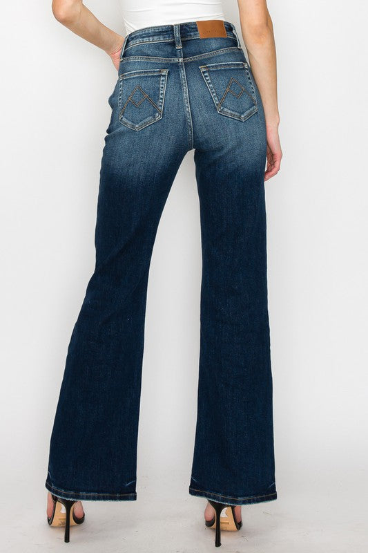 Artemis Vintage High Rise Holly Flare Jeans back view dark indigo wash high waist flared legs