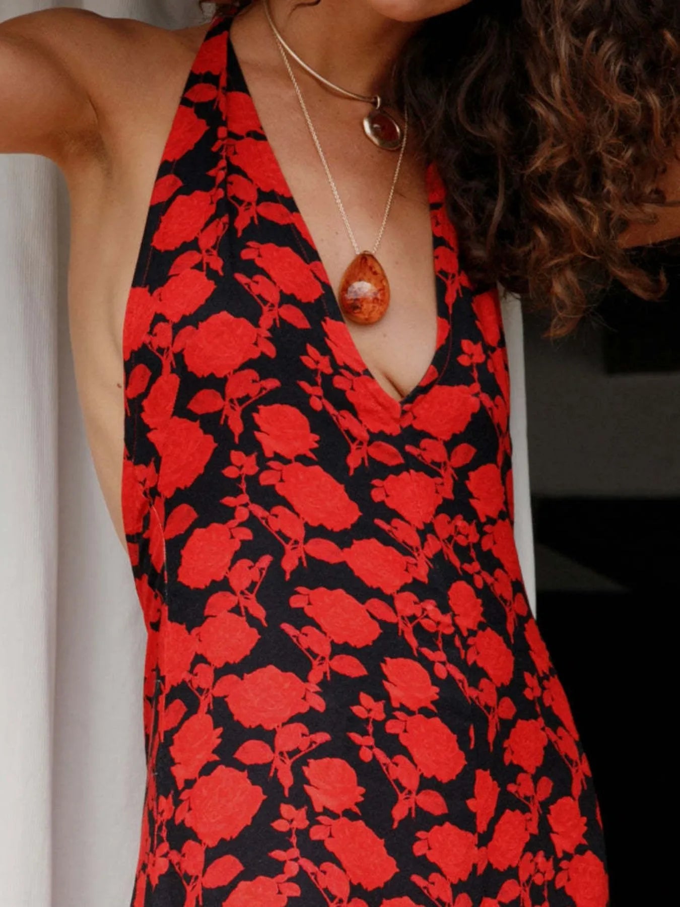 Trendsi Polka Dot Maxi Dress close up showing red floral print halter style with V neckline