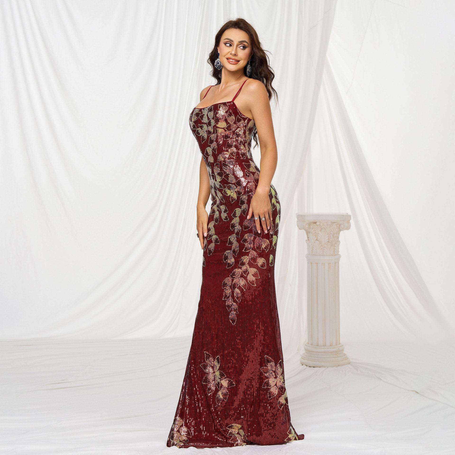 Stunning Sequined Fishtail Wedding Dress in burgundy with elegant floral patterns and fitted silhouette