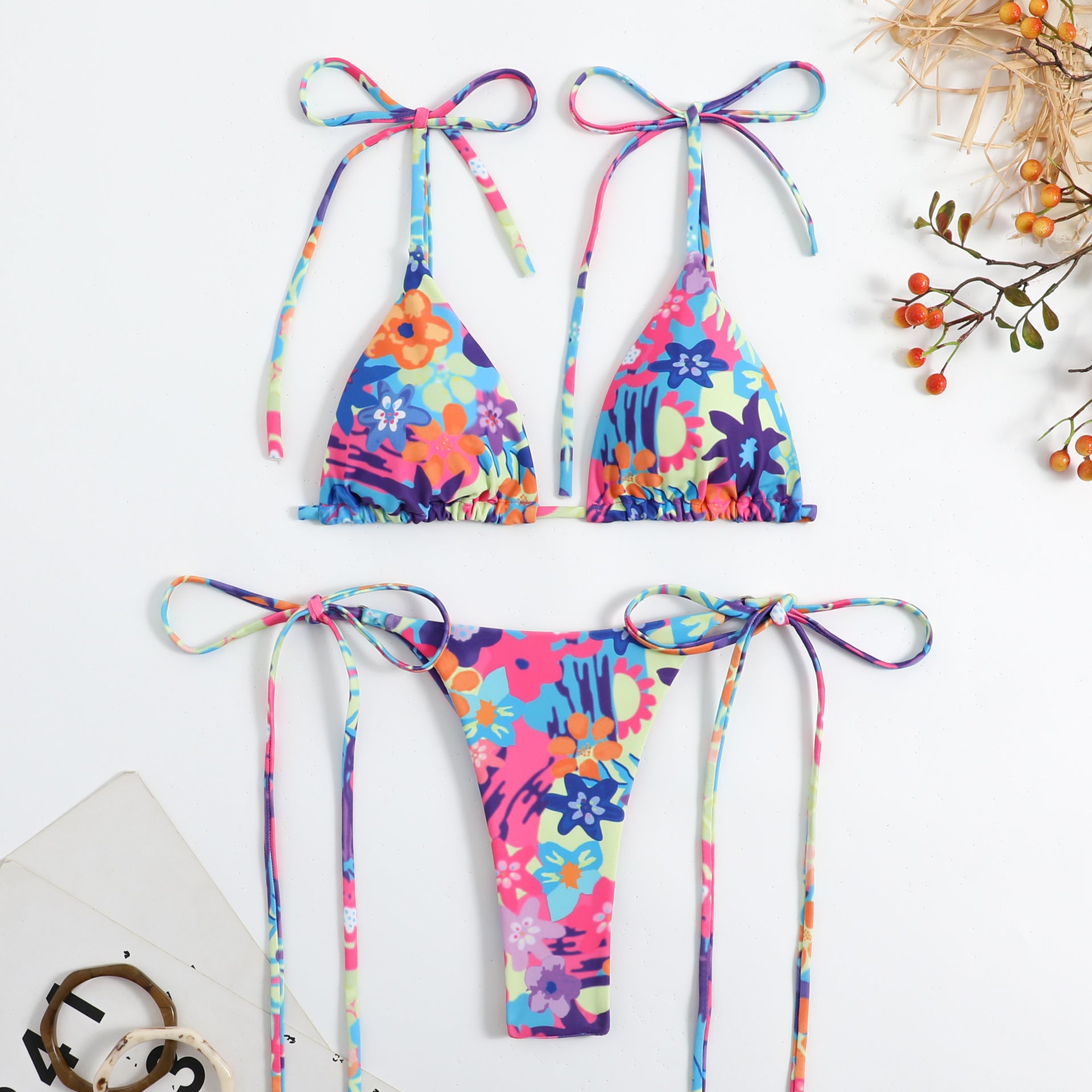 Trendsi stylish floral self tie bikini with colorful flower print and adjustable ties on a white background