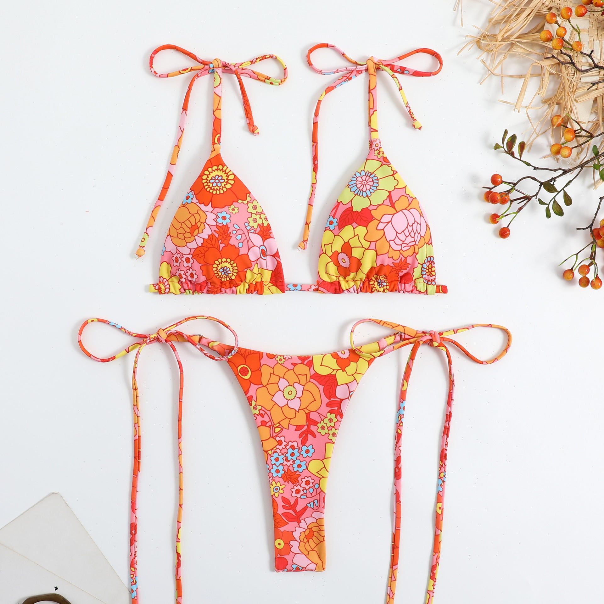 Trendsi Stylish Floral Self Tie Bikini in orange with colorful flower patterns and tie straps