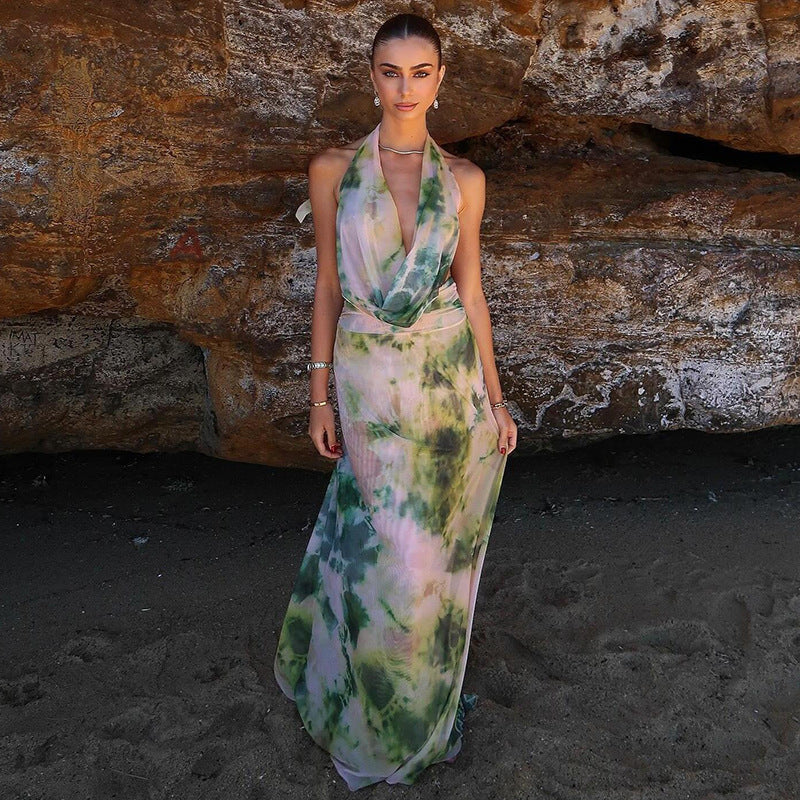 Stylish Tie-Dye Maxi Dress for women featuring a halter neckline and flowing fabric.