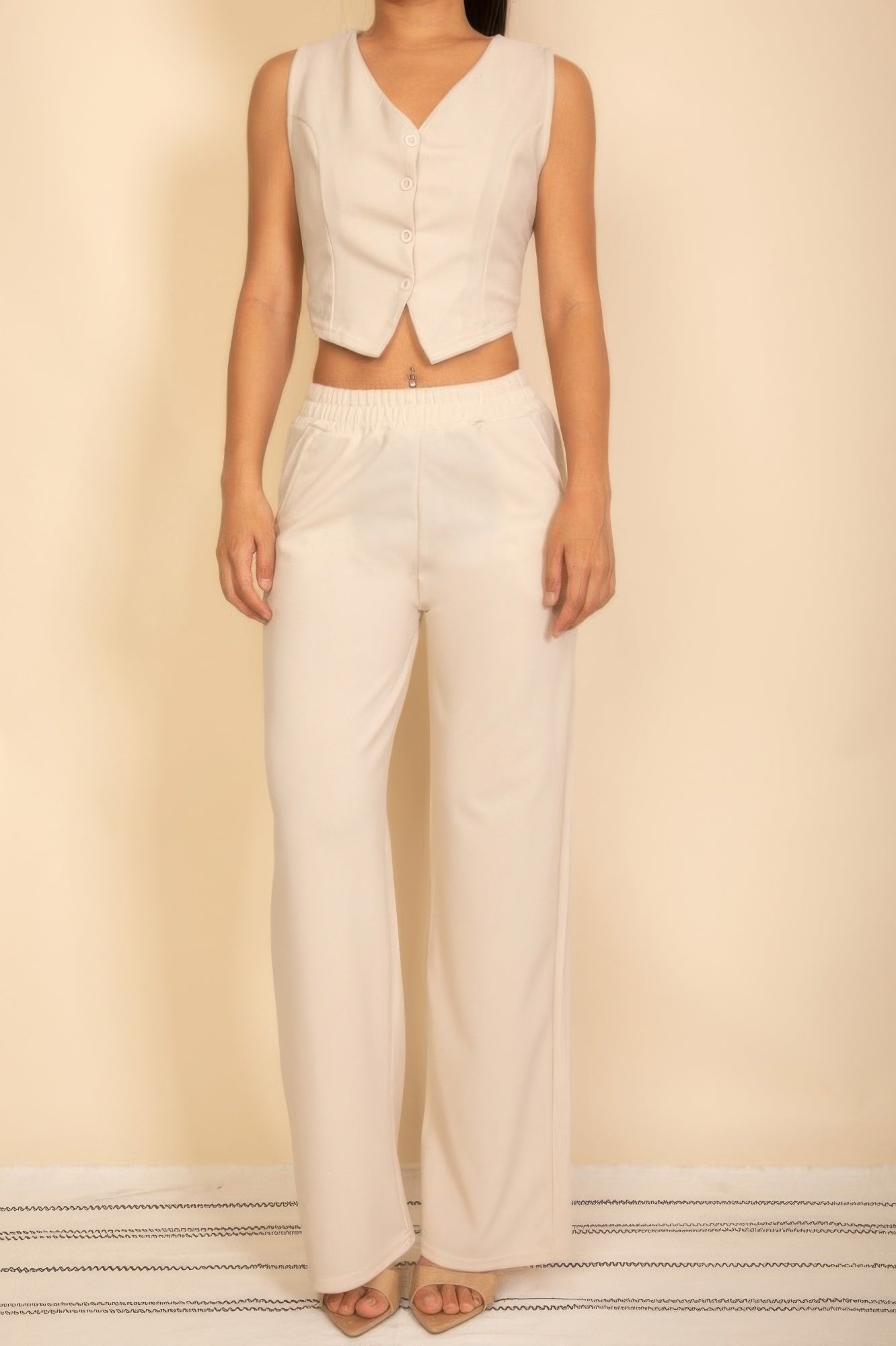 Beige Tailored Button Vest for women, paired with matching wide-leg pants for a chic outfit